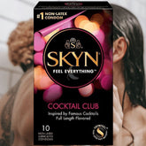 A box of LifeStyles SKYN Cocktail Club Non-Latex Condoms, featuring the "Feel Everything" tagline, is prominently displayed. The black box with vibrant, bokeh-style circles in pink and orange claims to be "Inspired by Famous Cocktails" and contains 10 lubricated and scented condoms.